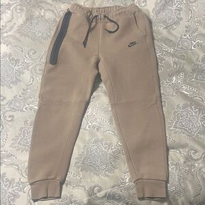 Like new worn twice Nike Tech Men Beige Joggers with Black Accents in small